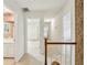 This hallway has carpeted floors, neutral walls, and access to bathrooms and bedrooms at 5545 Durrett Dr, Atlanta, GA 30338
