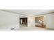 Bright living room featuring detailed crown molding, hardwood floors and entryways to other rooms at 5545 Durrett Dr, Atlanta, GA 30338