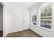 Bedroom with hardwood-style floors and two sunny windows at 1931 Brian Way, Decatur, GA 30033