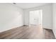 The bedroom is spacious and has grey wood-look flooring at 1931 Brian Way, Decatur, GA 30033