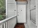 Exterior entryway with white door, trim, and a 'Wipe Your Paws' welcome mat at 1931 Brian Way, Decatur, GA 30033