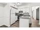 Charming kitchen with granite countertops and white cabinetry at 1931 Brian Way, Decatur, GA 30033