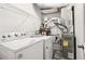 Laundry room with washer, dryer, shelves and water heater at 1931 Brian Way, Decatur, GA 30033