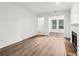 Bright living room featuring a fireplace and hardwood floors at 1931 Brian Way, Decatur, GA 30033