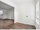 Open living room with neutral walls and hardwood-style floors at 1931 Brian Way, Decatur, GA 30033