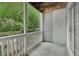 Enclosed patio with sliding doors and view of surrounding landscape at 1931 Brian Way, Decatur, GA 30033