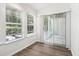 Bright sunroom featuring two windows and sliding glass door at 1931 Brian Way, Decatur, GA 30033