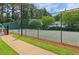 Well-maintained outdoor tennis court with green surroundings at 1931 Brian Way, Decatur, GA 30033