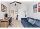 Bedroom featuring a sectional sofa and desk, ideal for a home office or study at 327 Nobleman Way, Canton, GA 30114