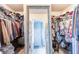 Walk-in closet with organized shelving and ample storage space at 327 Nobleman Way, Canton, GA 30114
