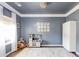 Bright playroom featuring gray accent walls, white trim, lots of toys, and a playful rug at 327 Nobleman Way, Canton, GA 30114