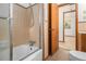 Standard bathtub with shower and tile walls in bathroom at 4125 Lindsey Dr, Decatur, GA 30035
