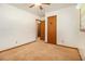 Bedroom with neutral carpet and view to bedroom doors and closet at 4125 Lindsey Dr, Decatur, GA 30035