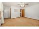 Spacious bedroom with neutral carpet and a ceiling fan, offering a cozy feel at 4125 Lindsey Dr, Decatur, GA 30035