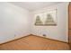 Bedroom boasts neutral walls and carpet, a closet, and a window for natural light at 4125 Lindsey Dr, Decatur, GA 30035