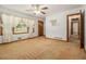 Inviting living room with neutral carpet, large window and classic design elements at 4125 Lindsey Dr, Decatur, GA 30035