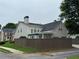 View of the backyard showing a fenced-in yard, and landscaped details at 636 Lantern Park Ln, Scottdale, GA 30079