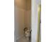 Accessible bathroom features a raised toilet with grab bars for added safety and convenience at 636 Lantern Park Ln, Scottdale, GA 30079