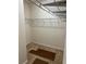 Walk-in closet featuring wire shelving and carpeted floor at 636 Lantern Park Ln, Scottdale, GA 30079