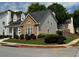 A well-maintained house with stone accents, tidy landscaping, and a neatly manicured lawn at 636 Lantern Park Ln, Scottdale, GA 30079