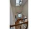 Foyer featuring wood floors, staircase, and view to living room at 636 Lantern Park Ln, Scottdale, GA 30079