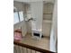 Elevated view showcasing a living room with fireplace and tall ceilings at 636 Lantern Park Ln, Scottdale, GA 30079