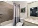 Bathroom features a shower/tub combo and a white granite vanity at 1661 Hammock Dr, Smyrna, GA 30080