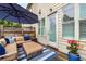 Inviting backyard deck features comfortable outdoor seating, rug, and a privacy fence at 1661 Hammock Dr, Smyrna, GA 30080