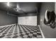 Garage features black and white checkered floors and gray walls at 1661 Hammock Dr, Smyrna, GA 30080