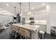 Open kitchen with an island, pendant lighting, and stainless appliances at 1661 Hammock Dr, Smyrna, GA 30080