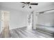 Bedroom with closet and full bathroom with white vanity and new faucet at 1822 Commonwealth Dr, Woodstock, GA 30188