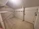 Walk-in closet with shelving for storage at 1822 Commonwealth Dr, Woodstock, GA 30188