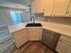 Modern kitchen featuring stainless steel appliances, stylish cabinets, and black sink at 1822 Commonwealth Dr, Woodstock, GA 30188