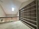 Bright loft space with skylight and built-in shelving at 1822 Commonwealth Dr, Woodstock, GA 30188