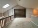 Bright loft with a skylight and built-in shelving at 1822 Commonwealth Dr, Woodstock, GA 30188