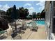 Relaxing pool area with plenty of lounge chairs and tables, perfect for enjoying sunny days by the water at 1822 Commonwealth Dr, Woodstock, GA 30188