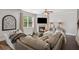 Comfortable living room with a fireplace, large window, and a plush sectional sofa, perfect for relaxation at 2127 Apple Orchard Way, Austell, GA 30168