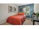 This bedroom features a comfortable bed, window with blinds, and sleek desk, perfect for relaxing or studying at 2363 Haran Dr # 35, Lithonia, GA 30058