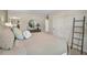 Bedroom boasts a comfy bed and views to an ensuite bathroom at 2363 Haran Dr # 35, Lithonia, GA 30058