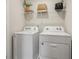Convenient laundry room featuring a modern washer and dryer for efficient laundry care at 2363 Haran Dr # 35, Lithonia, GA 30058