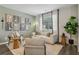 Comfortable living room featuring stylish decor, natural light, and contemporary furniture at 2363 Haran Dr # 35, Lithonia, GA 30058