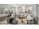 Bright and airy living room with stylish decor, an open floor plan, and a view into the dining area at 2363 Haran Dr # 35, Lithonia, GA 30058