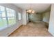 Cozy breakfast nook filled with natural light next to the living room at 4676 Shaded Oak Ln, Forest Park, GA 30297