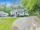 Charming single-story home with well-maintained front yard and driveway at 118 Greenwood St, Fairburn, GA 30213