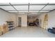 Spacious garage with epoxy flooring offering plenty of room for parking and storage at 2115 Creekstone Point Dr, Cumming, GA 30041