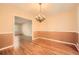 Classic dining room with chandelier and chair rail detail at 421 Fond Du Lac Dr, Stone Mountain, GA 30088