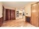 An open kitchen features stainless steel appliances, light colored cabinets, and hardwood floors at 421 Fond Du Lac Dr, Stone Mountain, GA 30088