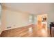 Inviting living room with hardwood floors, natural light, and easy access to the dining area at 421 Fond Du Lac Dr, Stone Mountain, GA 30088
