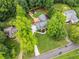 Aerial view of the landscaped home, showcasing its spacious lot and neighborhood at 5761 E Emerald Oaks Ln, Acworth, GA 30102