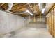 Unfinished basement with exposed ceiling and concrete walls offering room for personalization at 5761 E Emerald Oaks Ln, Acworth, GA 30102